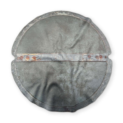 A SEWER LID YOU CAN CLEAN YOUR GLASSES WITH